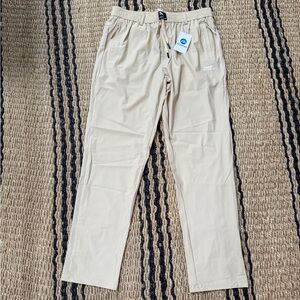 Men’s Meshiron cream workout pants in size Large. NWT